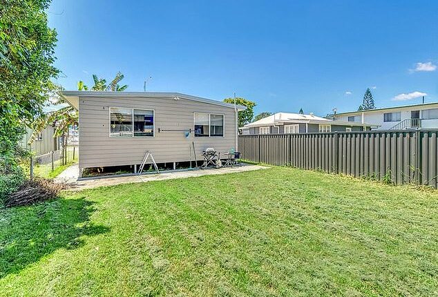 Australians on average salaries can still buy a house near the city if they are prepared to compromise - and even get in with a five per cent deposit. Hemmant, 10km east of Brisbane's city centre has a median house price of $800,342, based on CoreLogic data. But a smaller two-bedroom house (pictured) is on the market for $599,000