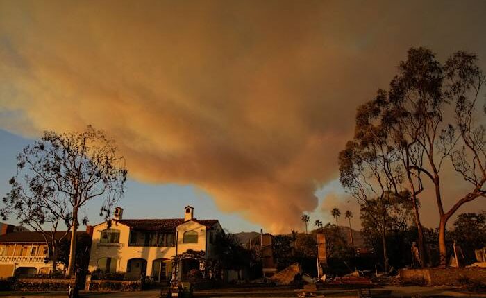 With their Los Angeles-area homes still smoldering, families return to search the ruins for memories