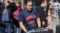 Ash Barty was pictured at Queenstown Airport with husband Garry and their son Hayden