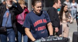 Ash Barty was pictured at Queenstown Airport with husband Garry and their son Hayden