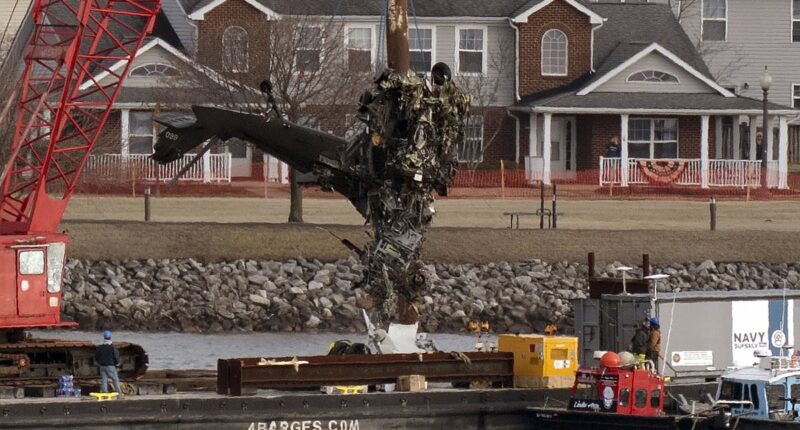 Black Hawk's tracking tech was turned off when it crashed into plane as mangled wreck is pulled from Potomac