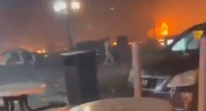 Blood-curdling cries as flaming debris rains down around children outside Dunkin' after plane crash