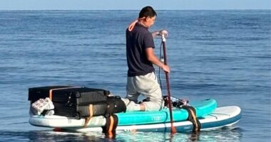 Chinese migrant on paddleboard with suitcase in tow apprehended near Bahamas days after separate Florida bust