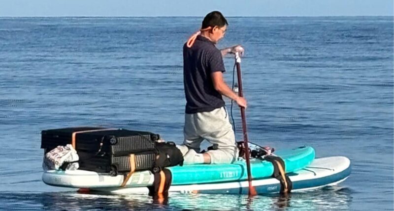 Chinese migrant on paddleboard with suitcase in tow apprehended near Bahamas days after separate Florida bust