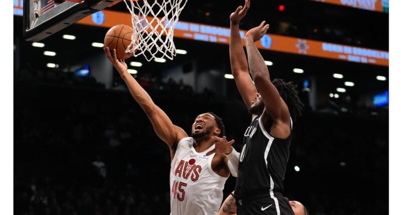 Donovan Mitchell scores 26 points as the Eastern Conference-leading Cleveland Cavaliers beat Brooklyn Nets 110-97