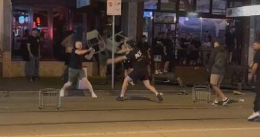 The two groups clashed and used metal chairs and umbrellas during the brawl after yesterday's Melbourne derby between Victory and City.