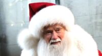 Hollywood star looks unrecognisable as he rocks Santa costume while filming scenes for new Christmas movie - but do YOU know who it is?