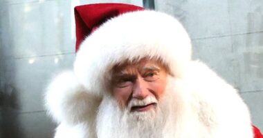 Hollywood star looks unrecognisable as he rocks Santa costume while filming scenes for new Christmas movie - but do YOU know who it is?