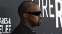 Kanye West reacts to being kicked out of the Grammys as he slams the 'boring' event and brands his 'naked' wife Bianca Censori's outfit as ART