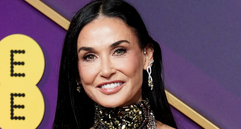 Leading Actress favourite Demi Moore, 62, looks sensational in a dazzling backless sequin gown as she arrives at the 2025 BAFTAs