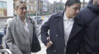 Chelsea and Australia soccer player Sam Kerr, right, arrives with partner Kristie Mewis at Kingston Crown Court, London.