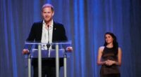 Meghan looks on lovingly as Prince Harry opens Invictus Games in front of whooping Vancouver crowd as he beams: 'What a beautiful sight!'