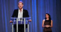 Meghan looks on lovingly as Prince Harry opens Invictus Games in front of whooping Vancouver crowd as he beams: 'What a beautiful sight!'