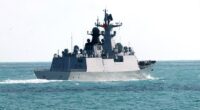 China has ratcheted up its war of words with Australia, accusing it of 'hyping up' tensions over live firing exercises. China's Jiangkai-class frigate Hengyang is pictured off the Coral Sea on February 11