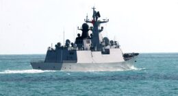 China has ratcheted up its war of words with Australia, accusing it of 'hyping up' tensions over live firing exercises. China's Jiangkai-class frigate Hengyang is pictured off the Coral Sea on February 11