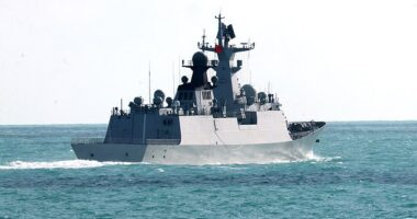 China has ratcheted up its war of words with Australia, accusing it of 'hyping up' tensions over live firing exercises. China's Jiangkai-class frigate Hengyang is pictured off the Coral Sea on February 11