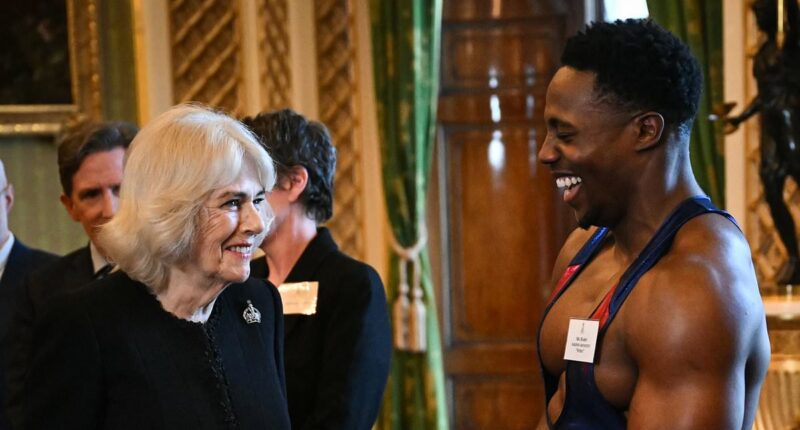 Queen Camilla left giggling after she was introduced to spanx-clad Gladiator Nitro from hit BBC show at glitzy Buckingham Palace reception