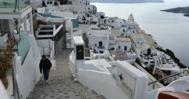 Santorini rocked by MORE earthquakes hours after holiday hotspot plunged into state of emergency as women and kids flee