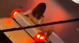 Shocking moment Iranian woman strips NAKED & leaps on cop car as she risks wrath of regime’s brutal ‘morality police’