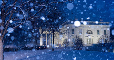 Snow and freezing rain pummel the mid-Atlantic while California prepares for likely flooding