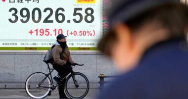 Stock market today: Asian shares rise following Wall Street rally on healthy earnings