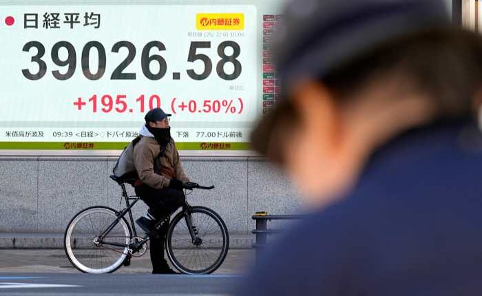 Stock market today: Asian shares rise following Wall Street rally on healthy earnings