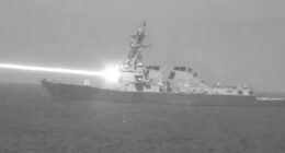 US Navy seen firing futuristic drone-destroying laser weapon dubbed ‘Helios’ from warship in incredible declassified pic