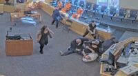 Video captures courtroom brawl as two men attack murder suspect during hearing