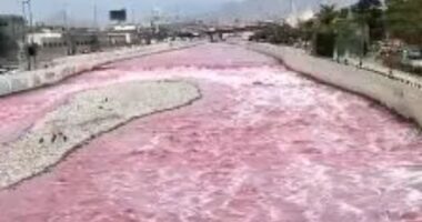 Watch as chilling footage shows major river mysteriously turn BLOOD RED – but officials insist: ‘You can drink it’