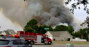 Crews battle wildfires in North and South Carolina amid dry conditions and gusty winds