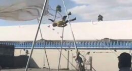 Moment human cannonball stuntman is seriously injured at fair after bouncing off safety net and slamming into the ground