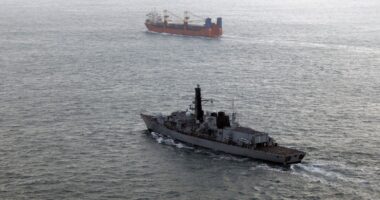 Battle-ready Russian warship spotted sailing through Channel escorting huge arms cache as  Royal Navy frigate deployed