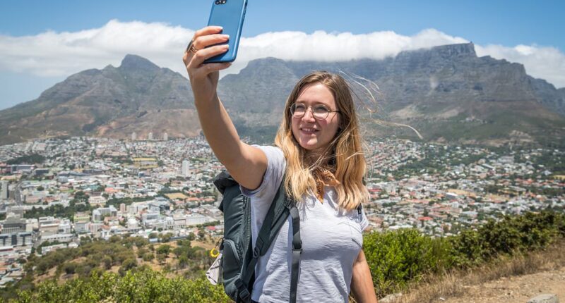 Cape Town becomes new anti-tourism flash point as activists condemn rise of selfie-taking digital nomads and holidaymakers are told 'stop coming to South Africa'