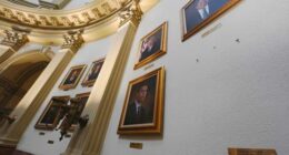 Colorado removes from its Capitol a portrait of Donald Trump that he called 'distorted'