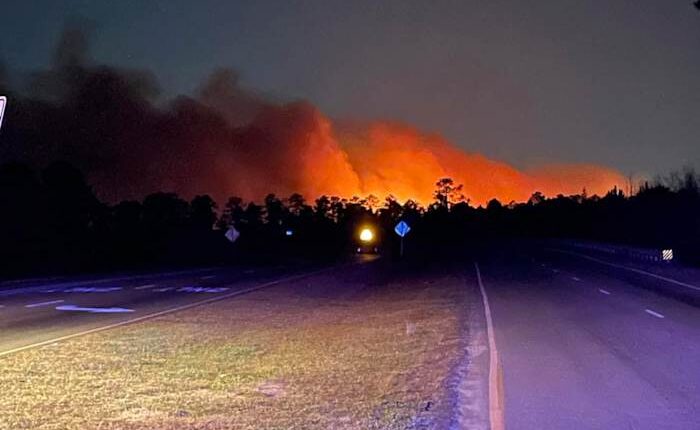 Crews battle wildfires in North and South Carolina amid dry conditions and gusty winds