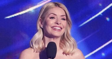 Holly Willoughby, 44, dazzles in an elegant white sequinned gown as she kicks off the Dancing On Ice Final amid doubts over the show's future