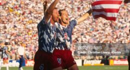 Alexi Lalas and Thomas Dooley (USA) celebrate a 2-1 victory over Colombia during a first round match of the 1994 FIFA World Cup. (Photo by Christian Liewig/TempSport/Corbis via Getty Images)