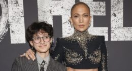 Jennifer Lopez's child Emme suits up and flashes new piercings on Othello opening night red carpet