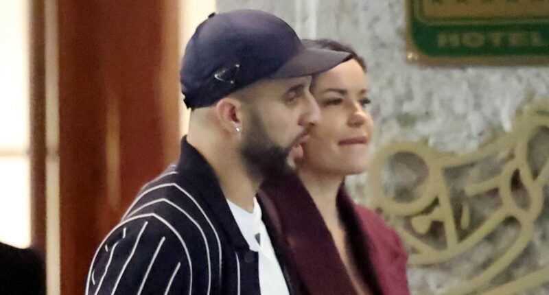 Kyle Walker puts his arm around mystery brunette in Milan days after family day with Annie Kilner and his children