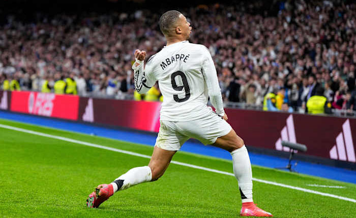 Mbappé and Vinícius score as Real Madrid beats Rayo to join Barcelona at the top of Spanish league