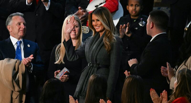 Melania stuns in gray as she supports Trump during his big political night