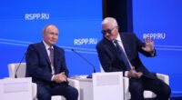 Moment smirking Putin chuckles about keeping Trump waiting before 'leaving event one hour after historic phone call was due to begin'