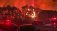 North and South Carolina wildfires rip through dozens of neighborhoods as locals are told to evacuate