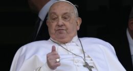 Pope Francis appears on his hospital balcony before he is discharged after extraordinary recovery from pneumonia but will now need two months to rest at the Vatican