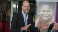 Prince William appears in cheerful spirits as he fires up a laptop during visit to a mental health charity close to his and Kate Middleton's hearts