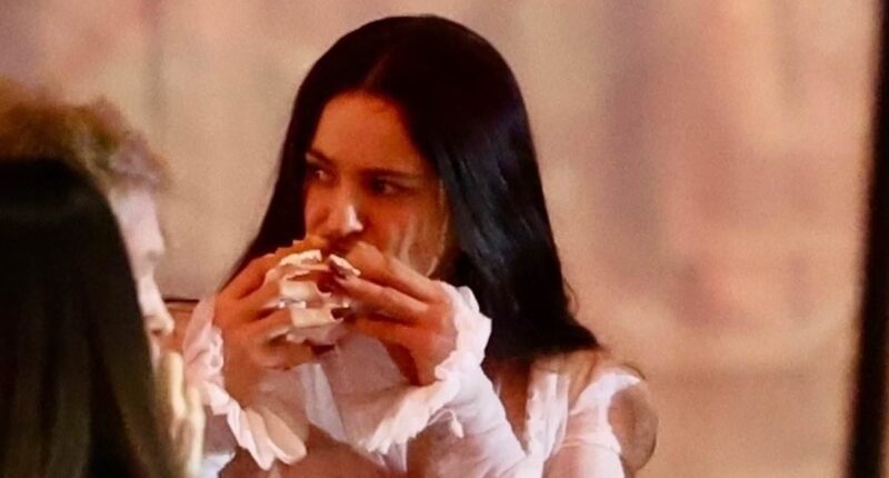 Rosalia devours a burger and Demi Moore consoles herself with french fries after huge Oscars loss as worse for wear stars leave Vanity Fair bash