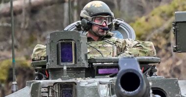 Tanks a lot! Prince William rides in British tank during visit to Nato base just 90 miles from Putin's Russia as he 'gets his hands dirty' in show of support for Estonia