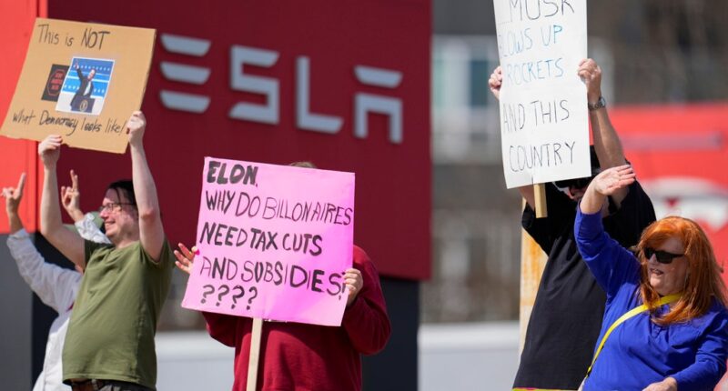 Tesla vehicles, charging stations targeted as protesters denounce DOGE, Elon Musk