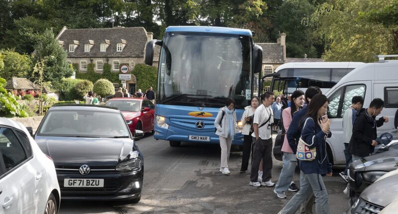 The picture postcard villages tormented by tourists: How overcrowded streets, clogged roads and coach parties peering through windows are shattering tranquility of Britain's prettiest places to live