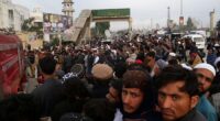 Thousands attend funeral for senior Taliban-linked cleric slain in Pakistan's northwest